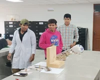 Researchers visit the laboratory where the analysis of materials from the 2023 field season is being carried out